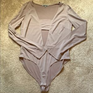 Tan long sleeve cut out body suit!